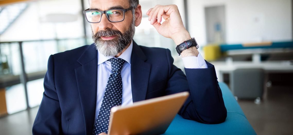 shot-of-thinking-financial-advisor-businessman-wor-AFYRT9E.jpg